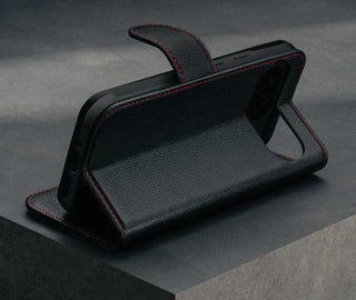 Stand function of the Black with Red Detail Leather Wallet Case for Google Pixel 9