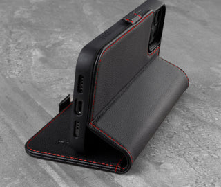 Integrated stand function of the Black Leather (with Red Stitching) Folio Case for iPhone 13