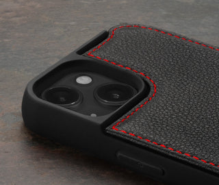 Camera cutout on the Black with Red Detail Leather Bumper Case for iPhone 15 Plus