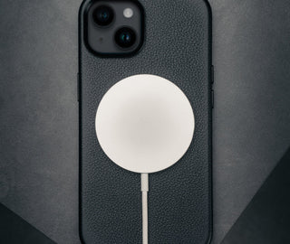 MagSafe charger attached to the Slimline Bumper Case for iPhone 15