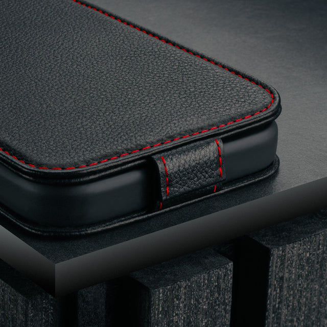 Magnetic closure clasp on the Black with Red Stitching Leather Flip Case for iPhone 17 Pro Max