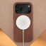 Wireless charger attached to the Brown Woven Texture Bumper Case for iPhone 17 Pro