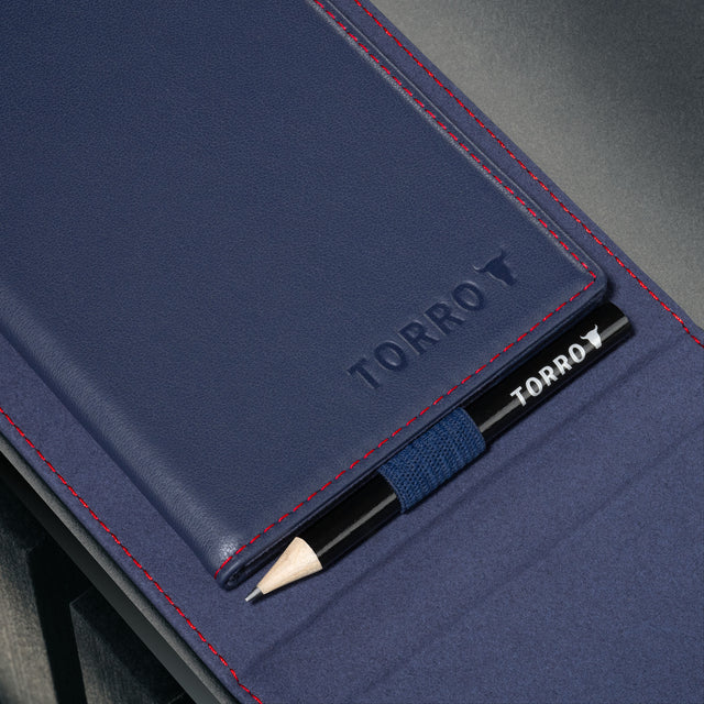 Magnetically attachable scorecard of the Navy Blue Leather Golf Scorecard & Yardage Book Holder